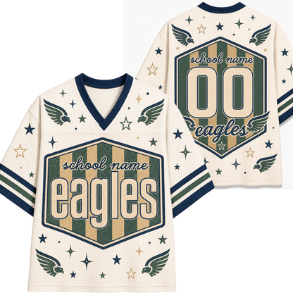 Front and back views of a custom football jersey. The jersey has an off-white base with navy blue and olive green graphics, featuring the word 'eagles' in a large shield on the front, 'school name' and number '00' on the back, and eagle wing motifs with stars on the sleeves and shoulders.