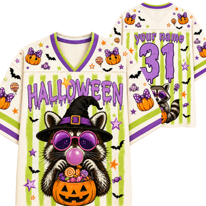 A Halloween-themed custom jersey shirt shown from both front and back. The jersey has a cream mesh base with purple and lime green trim, decorated with cartoon raccoons in witch hats, pumpkins, bats, stars, and the word 'HALLOWEEN' on the front.