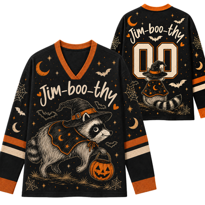 Front and back view mockup of the black and pumpkin orange Chaotic Club Halloween long sleeve jersey featuring a witch raccoon holding a pumpkin bucket, custom name, and number 00.