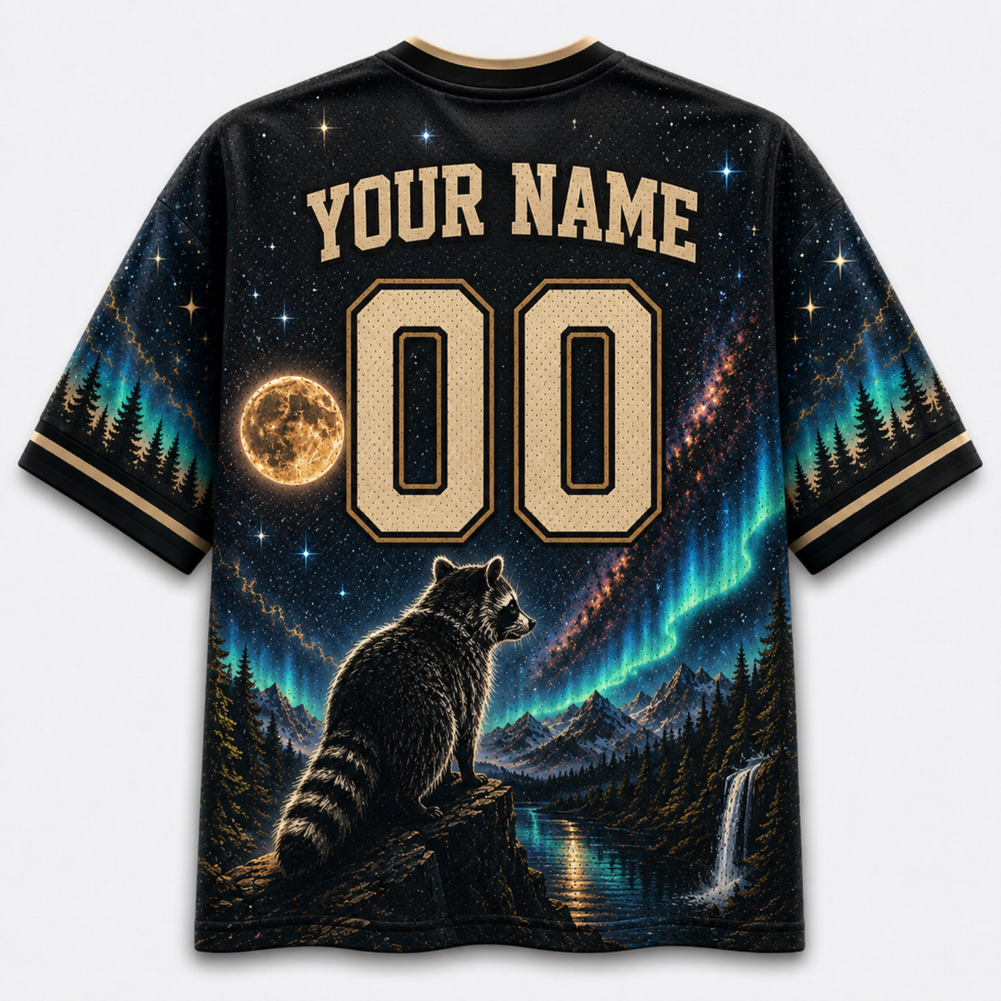 A custom short-sleeve t-shirt with a black base, featuring a detailed graphic print of a raccoon overlooking a waterfall and forest under a starry night sky with aurora lights. The shirt includes customizable text 'YOUR NAME' and '00' on the front.