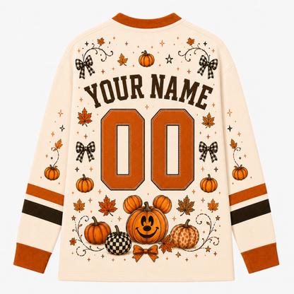 Back view of the customizable Chaotic Club long sleeve jersey showcasing 'YOUR NAME' typography above an orange athletic number 00 with a Mickey pumpkin graphic below.