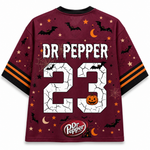 Back view of the Chaotic Club jersey displaying 'DR PEPPER' text above a cracked white number 23 with a pumpkin and official brand logo.