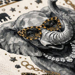 A close-up of a gray elephant illustration wearing leopard-print cat-eye sunglasses, with a silver chain necklace, gold stars, paw prints, and chain links on a light textured background.