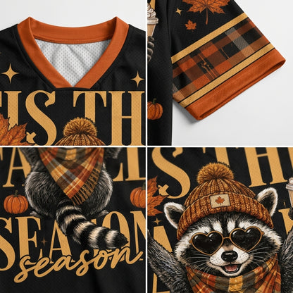 A four-panel product collage showing a black V-neck graphic sweatshirt with autumn themes. The top-left panel shows the collar and upper chest with orange trim and gold lettering.