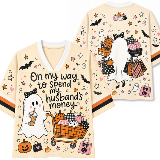 Front and back mockup preview of the cream Chaotic Club Halloween jersey featuring a shopping ghost with a pumpkin cart and designer shopping bags.