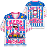 A white short-sleeve V-neck t-shirt with a colorful, cartoonish 'Lunch Lady' graphic on the front, shown alongside the back view of the same shirt. The design features a pink and blue striped background with stars, hearts, and a cartoon character wearing a pink bow and glasses.