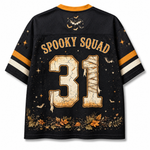 Back view of a black short-sleeve jersey with 'SPOOKY SQUAD' and the number '31' in a cracked beige stone texture, decorated with orange and white sleeve stripes, a bat graphic, stars, and autumn leaves.