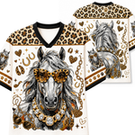 A white V-neck t-shirt with a detailed graphic print of a gray horse wearing leopard-print sunglasses and a gold chain necklace, styled with leopard-print shoulder panels and gold horseshoe and heart motifs.