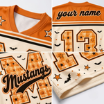 Product compilation highlighting the vibrant pumpkin orange V-neck ribbed collar, black and orange sleeve athletic stripes, floating bat graphics, and breathable mesh fabric.