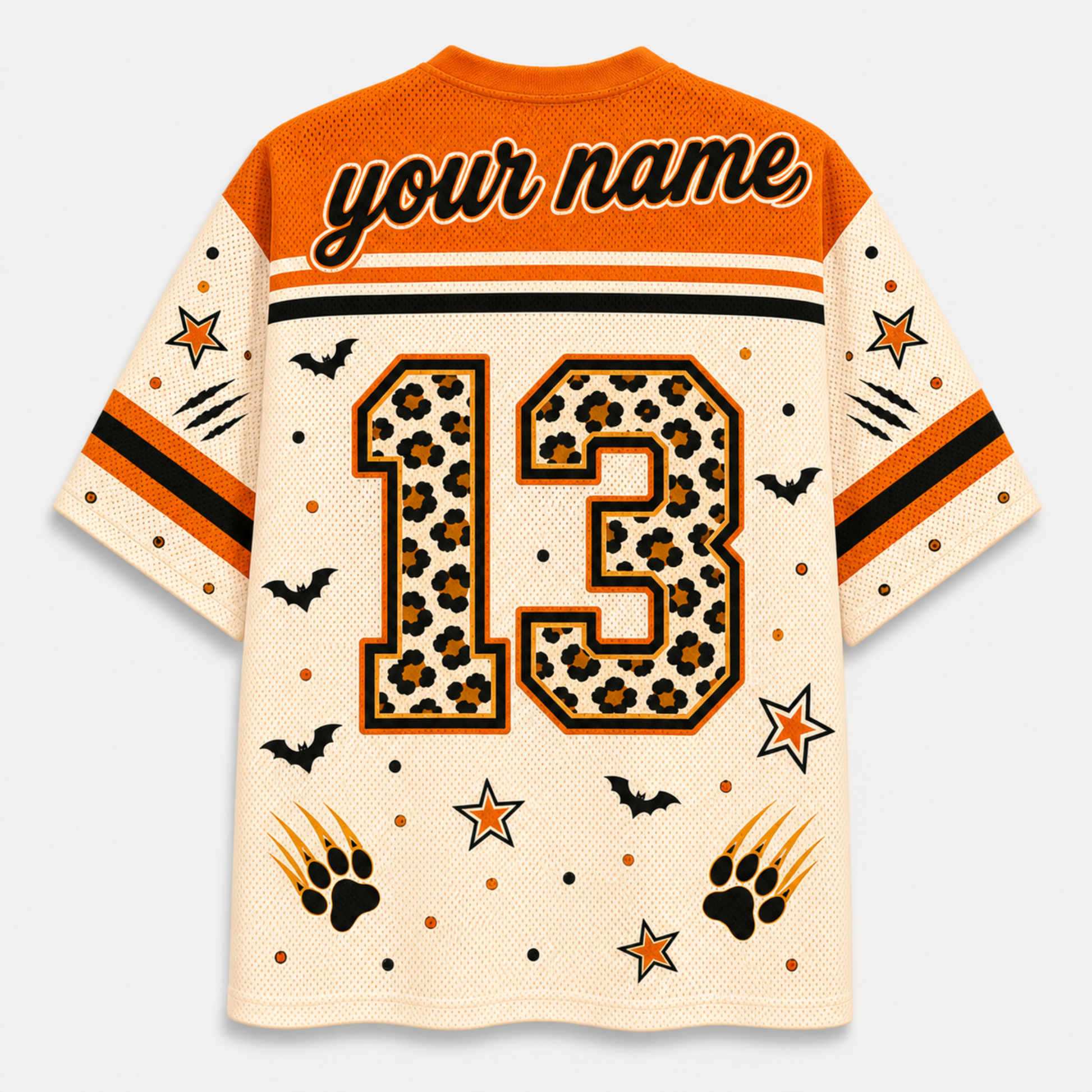 Customizable Halloween-themed short-sleeve jersey shown from the back, featuring a leopard-print number 13, bat silhouettes, paw prints, stars, and 'your name' text on an orange and cream mesh fabric.