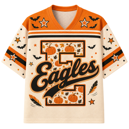 A short-sleeve V-neck football jersey with a cream mesh body, orange shoulder panels, and a large decorative number 2 graphic on the front featuring pumpkins, leaves, stars, bats, and the word 'Eagles' in black script.