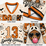 A four-panel product detail collage showing a Halloween-themed sports jersey. The top-left panel shows the V-neck collar with orange trim and a cream mesh fabric.