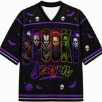 A black short-sleeve V-neck jersey with a colorful 'Spooky Season' graphic featuring horror movie character silhouettes, purple bats, skulls, and stars on a white background.