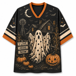 A black V-neck short-sleeve jersey-style shirt with orange trim and a Halloween graphic print featuring a ghost, haunted house, pumpkins, bats, stars, and a moon on a white background.