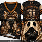 A four-panel product collage showing a Halloween-themed black V-neck jersey or shirt detail view: collar detail with a leopard-print bow, back design with 'Halloween Mystique 31' text and spider graphics, hem detail with a black cat illustration, and back-in design detail featuring a cat hood graphic.