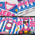 A four-panel product detail collage showing a colorful V-neck top. The panels label details including the V-neck collar, lower hem, rear view with text, and front print featuring a retro lunch-girl illustration on a blue-and-white striped background.
