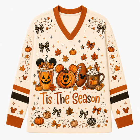 Front view of the cream long sleeve jersey displaying Mickey Mouse pumpkins, iced pumpkin spice latte, football, hot cocoa, and Tis The Season typography.