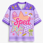 Front view of the yellow varsity jersey displaying 'Sped' typography over checkerboard stars surrounded by rainbows, pencils, and coquette ribbon bows.