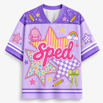 Front view of the yellow varsity jersey displaying 'Sped' typography over checkerboard stars surrounded by rainbows, pencils, and coquette ribbon bows.