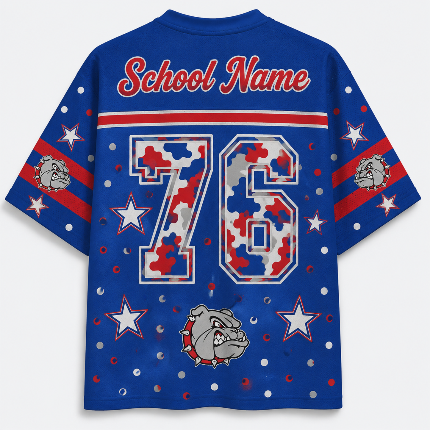 A royal blue short-sleeve t-shirt shown from the back, featuring a customizable 'School Name' text at the collar, a large number '76' filled with a red, white, and blue camouflage pattern, and a bulldog mascot graphic near the bottom. The sleeves have red and white stripes with bulldog head graphics, and the entire shirt is decorated with white stars and silver glitter dots.