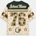 Customizable short-sleeve athletic jersey shown from the back, featuring a dark green collar and shoulders, cream body, camouflage patterned number 76, gold and dark green stripes on the sleeves, eagle head graphics, and 'School Name' text at the top.