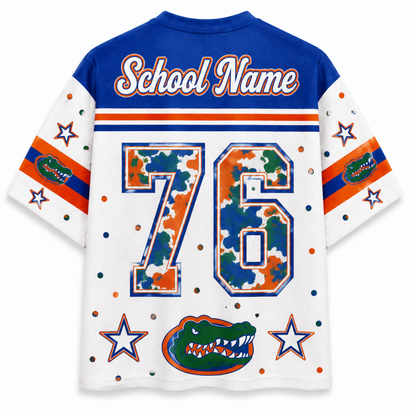 Custom Florida Gators themed short-sleeve jersey shown from the back, featuring a royal blue collar and shoulders, white body, orange and blue stripes, a camouflage patterned number 76, custom 'School Name' text, and an alligator logo at the bottom.