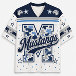 A white and navy blue athletic jersey-style shirt with a large camouflage-patterned letter M, the word Mustangs across the front, star and dot graphics, and horse head motifs on the shoulders and sleeves.