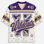 A short-sleeve V-neck jersey-style shirt with a white base, purple and gold trim, a large outlined letter W with camouflage fill, the word 'Wildcats' across the front, and wildcat head graphics near the shoulders with star accents.