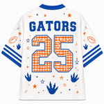 White mesh Florida Gators football jersey with blue and orange graphics, featuring 'GATORS' and the number '25' on the back.