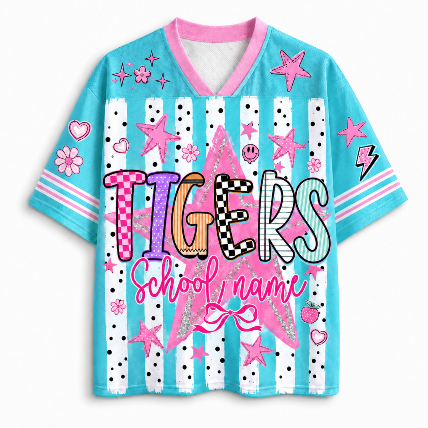 A short-sleeve V-neck t-shirt with a light blue body, pink collar and sleeve trim, and a colorful 'TIGERS School name' graphic on the front. The shirt features white vertical stripes with black polka dots, pink stars, hearts, flowers, and lightning bolts.