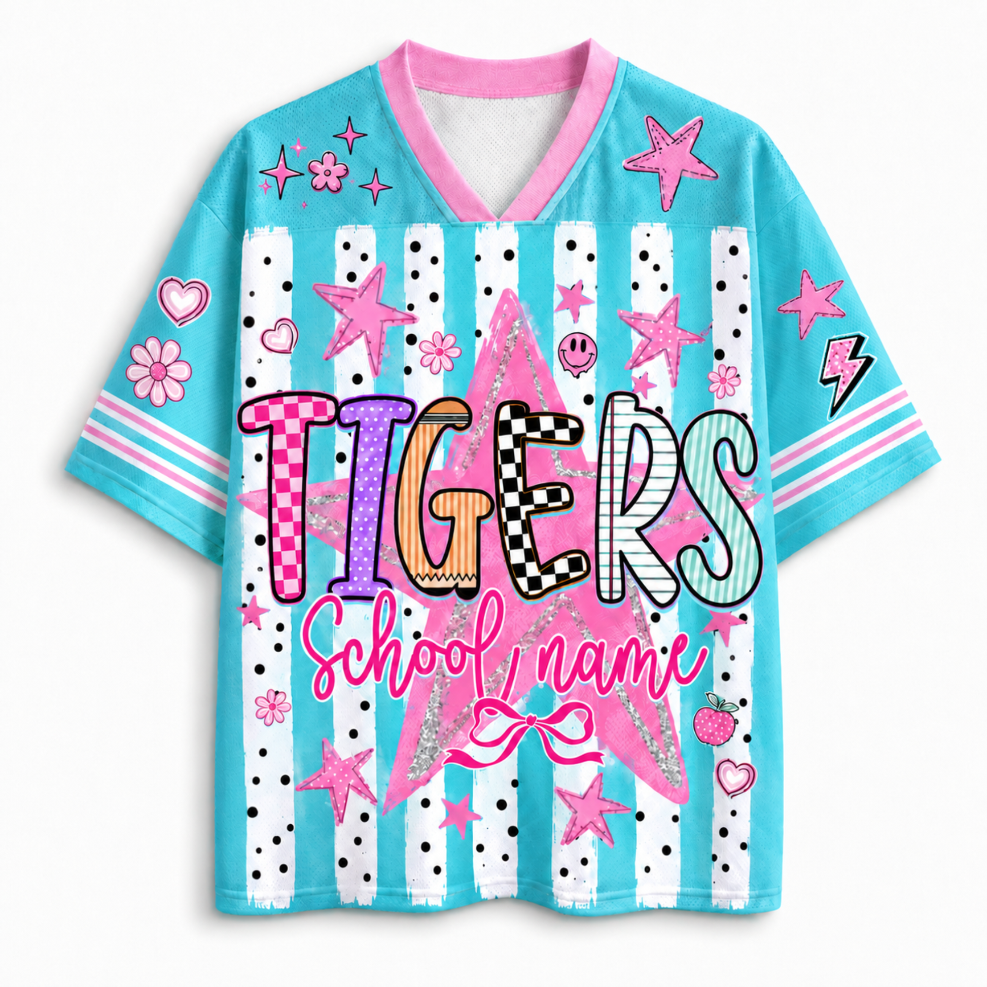 A short-sleeve V-neck t-shirt with a light blue body, pink collar and sleeve trim, and a colorful 'TIGERS School name' graphic on the front. The shirt features white vertical stripes with black polka dots, pink stars, hearts, flowers, and lightning bolts.