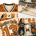Product compilation highlighting the black and cream V-neck ribbed collar, orange yoke with spooky trees and bats, sleeve raccoon pumpkin badges, and breathable mesh fabric.