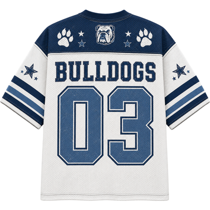 A Dallas Cowboys-style bulldog-themed football jersey shown from the back, with navy blue shoulder panels, white body, blue and white sleeve stripes, paw prints, stars, a bulldog logo, and large 'BULLDOGS 03' lettering.