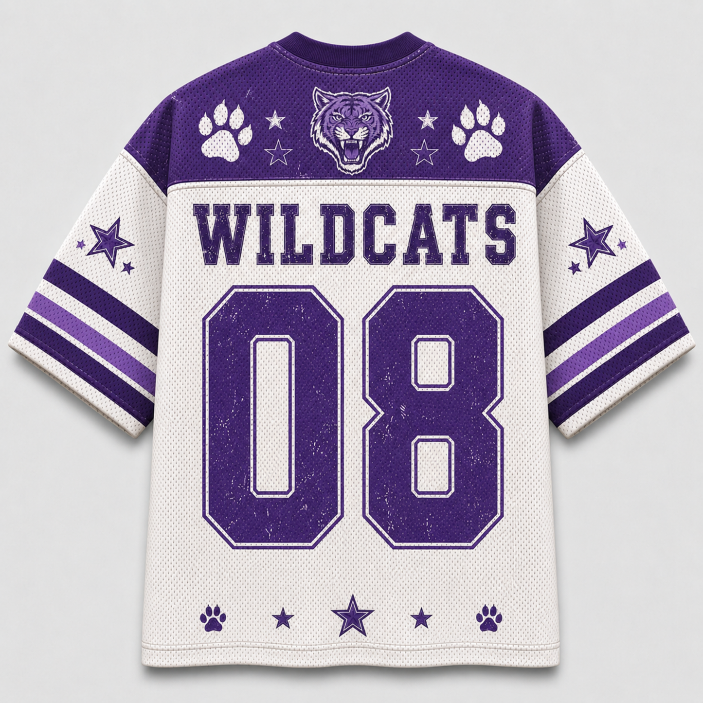 A white and purple athletic jersey shown from the back, featuring 'WILDCATS' and the number '08' in large purple block letters. The jersey has a purple collar, paw prints, a wildcat head graphic, and striped sleeves on a light gray background.