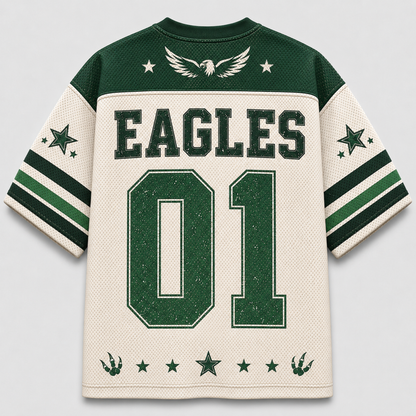 A vintage-style athletic jersey shown flat against a light gray background. The jersey is cream-colored with dark green mesh panels on the shoulders, collar, and sleeves, featuring green and white stripes on the sleeves.