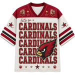 A short-sleeve V-neck jersey-style shirt with a white mesh body, red shoulder panels, and bold red text reading 'let's go CARDINALS CARDINALS CARDINALS CARDINALS CARDINALS' across the front. The design includes a large red cardinal head graphic, gold paw prints and stars, and black-and-red striped sleeve bands.
