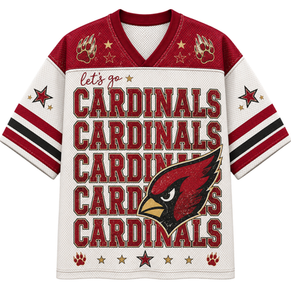A short-sleeve V-neck jersey-style shirt with a white mesh body, red shoulder panels, and bold red text reading 'let's go CARDINALS CARDINALS CARDINALS CARDINALS CARDINALS' across the front. The design includes a large red cardinal head graphic, gold paw prints and stars, and black-and-red striped sleeve bands.