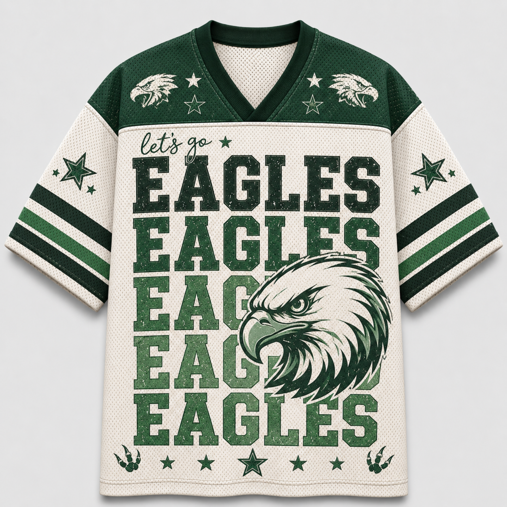 A short-sleeve V-neck football jersey with a cream mesh body, dark green shoulders, and green and cream graphics. The front features the words 'let's go EAGLES EAGLES EAGLES EAGLES EAGLES' in large green block letters, a large eagle head graphic, and star details on the sleeves and shoulders.