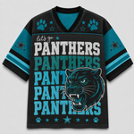 A black and teal short-sleeve V-neck jersey-style shirt with 'let's go PANTHERS' text, paw prints, stars, and a large panther graphic on the front, shown on a light gray background.