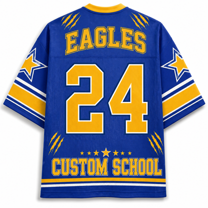A royal blue short-sleeve sports jersey with yellow and white graphics, featuring 'EAGLES' and the number '24' on the back, along with 'CUSTOM SCHOOL' text and star details.