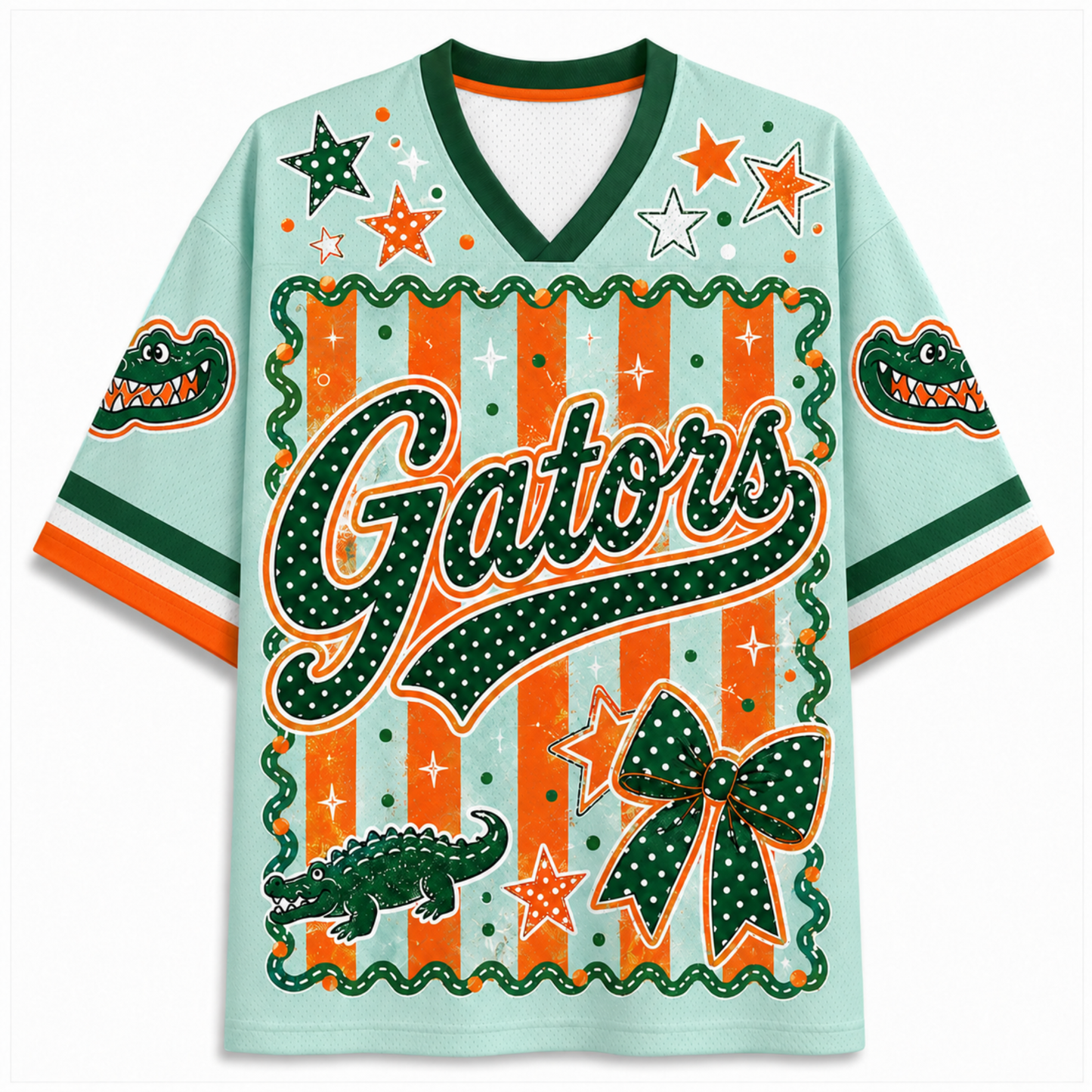 A light mint green V-neck t-shirt featuring Florida Gators graphics, including the word 'Gators' in green with white dots, orange stars, an alligator, and a bow on a striped background.