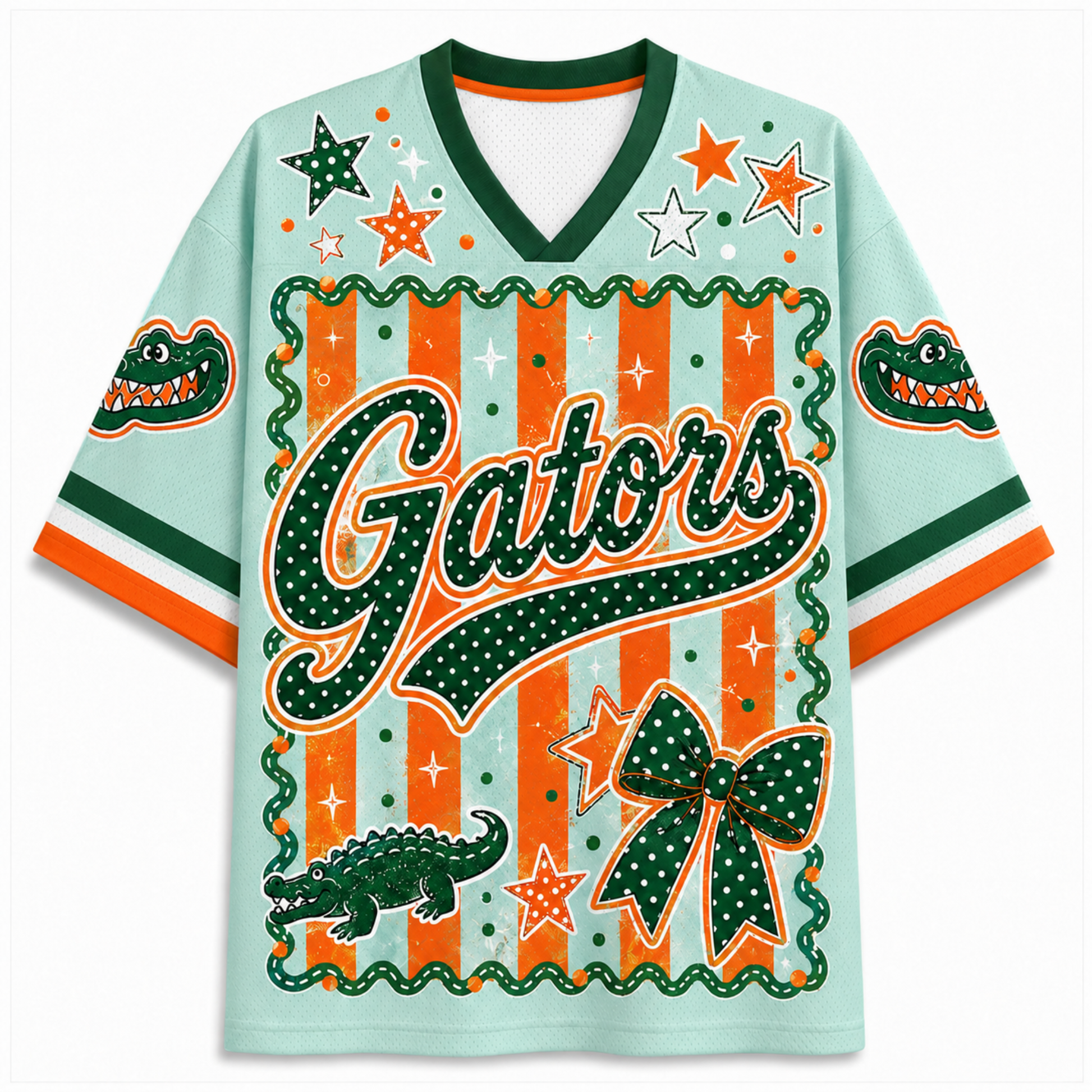 A light mint green V-neck t-shirt featuring Florida Gators graphics, including the word 'Gators' in green with white dots, orange stars, an alligator, and a bow on a striped background.