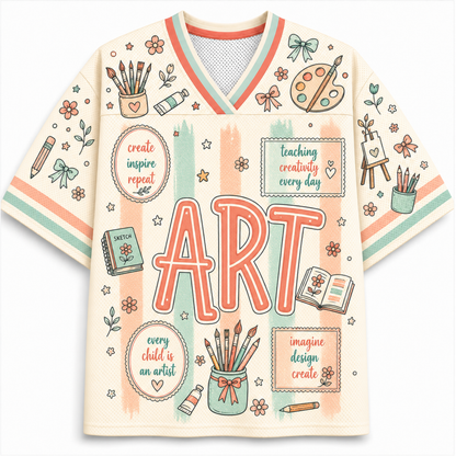 A short-sleeve V-neck athletic-style shirt with a cream base and colorful art-themed graphics, including the word ART in large letters, paint palettes, pencils, books, stars, and decorative text boxes.
