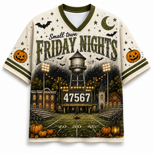 A short-sleeve V-neck football jersey with a cream mesh base and an all-over Halloween-themed graphic print. The design features 'Small town FRIDAY NIGHTS' text, jack-o'-lanterns, bats, a crescent moon, a water tower, a lit football field, and a large scoreboard reading 47567.