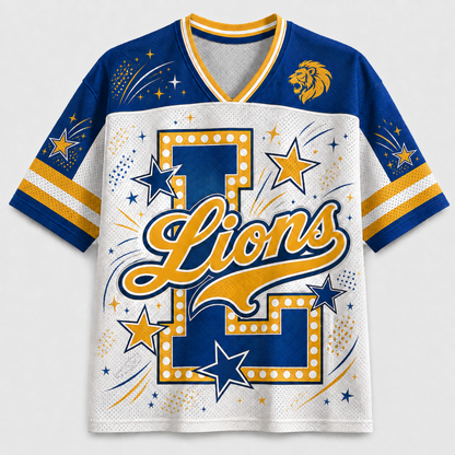 A short-sleeve V-neck jersey with a white body, royal blue sleeves and collar trim, and yellow/gold graphic details including the word 'Lions', stars, stripes, and a lion head logo on the shoulder.