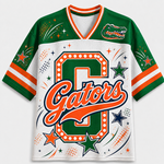 A green and white Florida Gators themed short-sleeve jersey with orange, green, and white graphics, featuring a large 'G' and 'Gators' script on the front.