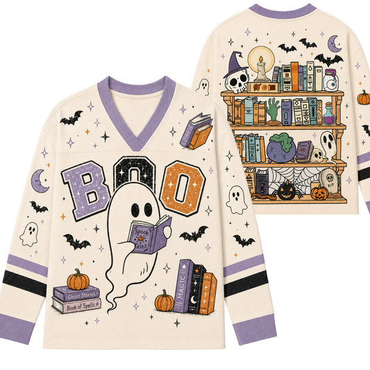Front and back view mockup of the cream and lavender purple Chaotic Club Halloween long sleeve jersey featuring a reading ghost with BOO letters and a detailed haunted bookshelf graphic.