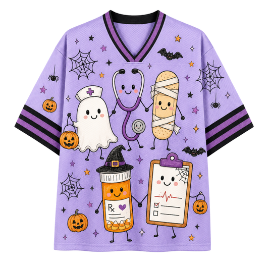 A light purple short-sleeve V-neck T-shirt with a Halloween-themed cartoon print, featuring a ghost, bandage, potion bottle, clipboard, stethoscope, spiderwebs, bats, and jack-o'-lanterns on a white background.
