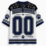 Customizable white and navy blue short-sleeve sports jersey shown from the back, featuring 'YOUR NAME' and '00' in large block numbers, paw prints, stars, stripes, and a panther logo.