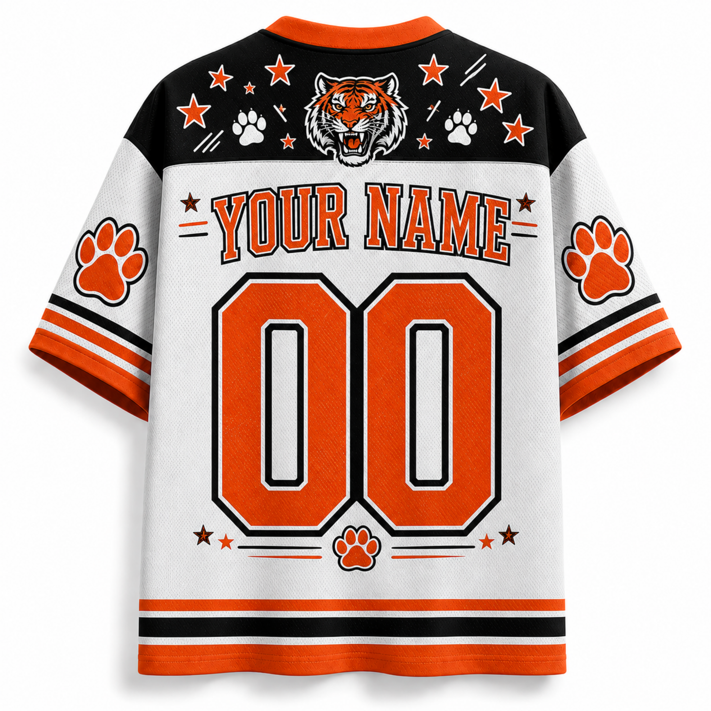 Customizable short-sleeve athletic jersey shown from the back, featuring a white body with orange and black stripes, a black upper yoke, orange paw prints, a tiger head graphic, and large orange '00' with 'YOUR NAME' text.